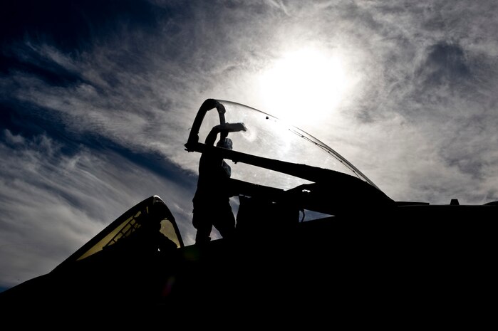 U.S. Air Force Airman 1st Class Adam Fingleman, 757th Aircraft Maintenance Squadron crew chief, cleans an A-10 Thunderbolt II canopy prior to flight Nov. 18, 2013, at Nellis Air Force Base, Nev. The A-10 Thunderbolt II can be serviced and operated from austere bases with limited facilities near battle areas. (U.S. Air Force photo by Airman 1st Class Christopher Tam)