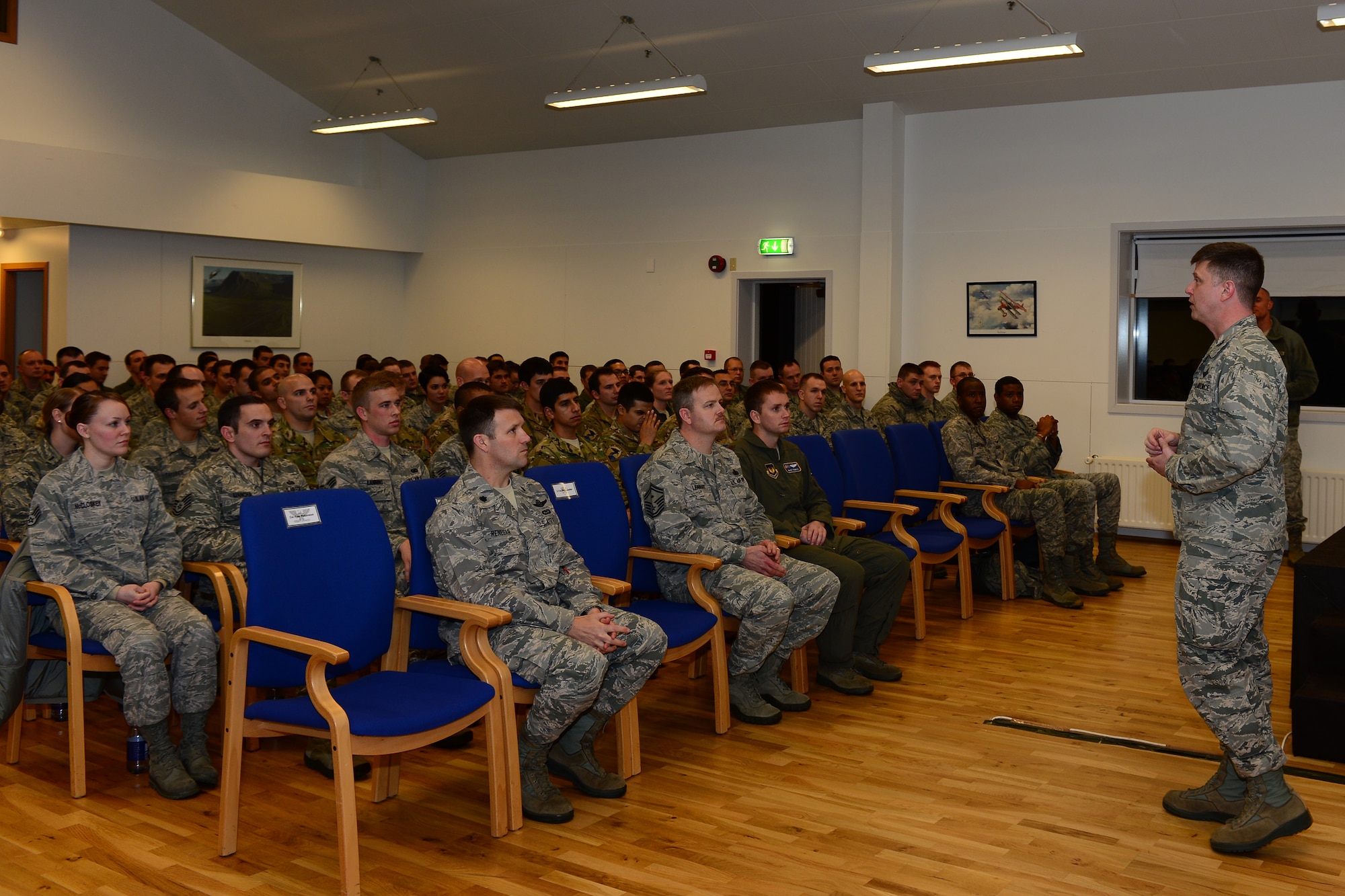 Col. Kyle Robinson, 48th Fighter Wing commander, speaks to Airmen at Keflavik International Airport, Iceland, Nov. 14, 2013. Robinson arrived with Lt. Gen. Craig Franklin, 3rd Air Force and 17th Expeditionary Air Force commander, to thank Airmen for their hard work and dedication during this deployment and reminded Airmen how important the unique mission is here. The 48th Air Expeditionary Group has been maintaining the North Atlantic Treaty Organization air surveillance and policing mission here since Oct. 28, 2013. (U.S. Air Force photo by Airman 1st Class Dana J. Butler/Released) 