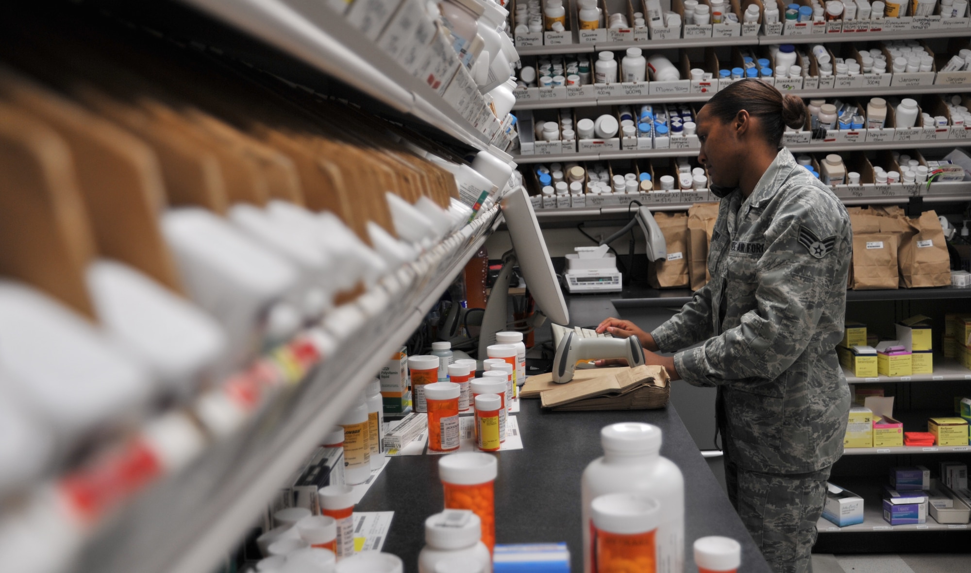 Senior Airman Lesley Perry, pharmacy technician, fills prescriptions at Maxwell Air Force Base, Nov. 6. During the medical group’s recent inspection, the pharmacy was instrumental in the group receiving a rating of excellent, with the pharmacy earning a perfect score with no findings. (U.S. Air Force photo by Staff Sgt. Natasha Stannard)