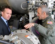 PETERSON AIR FORCE BASE, Colo. Acting Secretary of the Air Force, Eric Fanning, listens to Lt. Col. Luke Thompson as he explains the Modular Airborne Fire Fighting System during a visit Nov. 1 here. Fanning met with several members of the Air Force Reserve Command’s 302nd Airlift Wing during stop. He later spoke and answered questions at a base-wide all call. Thompson is the chief of aerial fire fighting for the 302nd AW. (U.S. Air Force photo/Duncan Wood) 