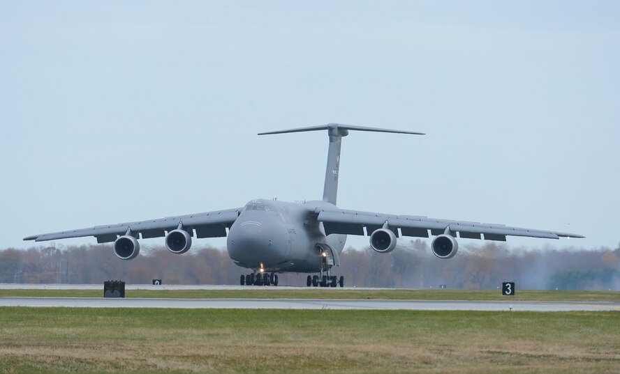 C-5M Super Galaxy, serial # 85-0004, lands at Dover Air Force Base, Del. to complete its delivery flight after upgrade to a Super Galaxy by Lockheed Martin Corp. in Marietta, Ga. on Nov. 21, 2013. 85-0004, is the 13th C-5M model to be delivered to the USAF and joins the 436th Airlift Wing, currently the sole front-line transport Wing to operate the C-5M. (U.S. Air Force photo/Greg L. Davis)