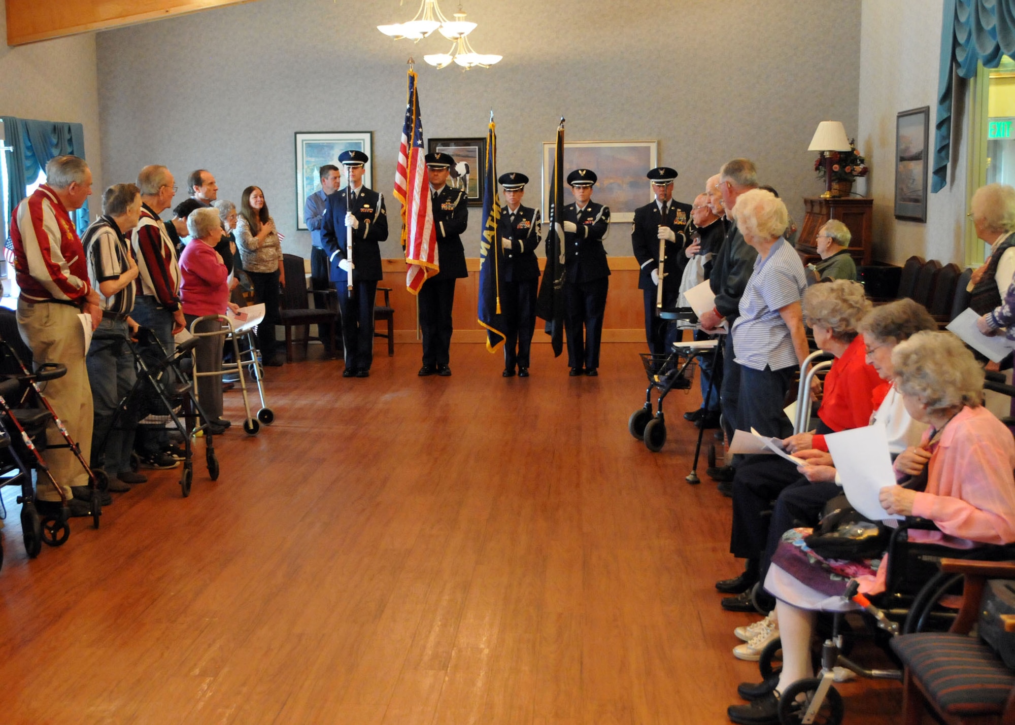 Members of the Montana Air National Guard Honor Guard present the colors for the residents of The Lodge Retirement and Care Center during their annual Veterans Day ceremony in Great Falls, Mont. on Nov. 11, 2013.  National Guard photo/Senior Master Sgt. Eric Peterson.