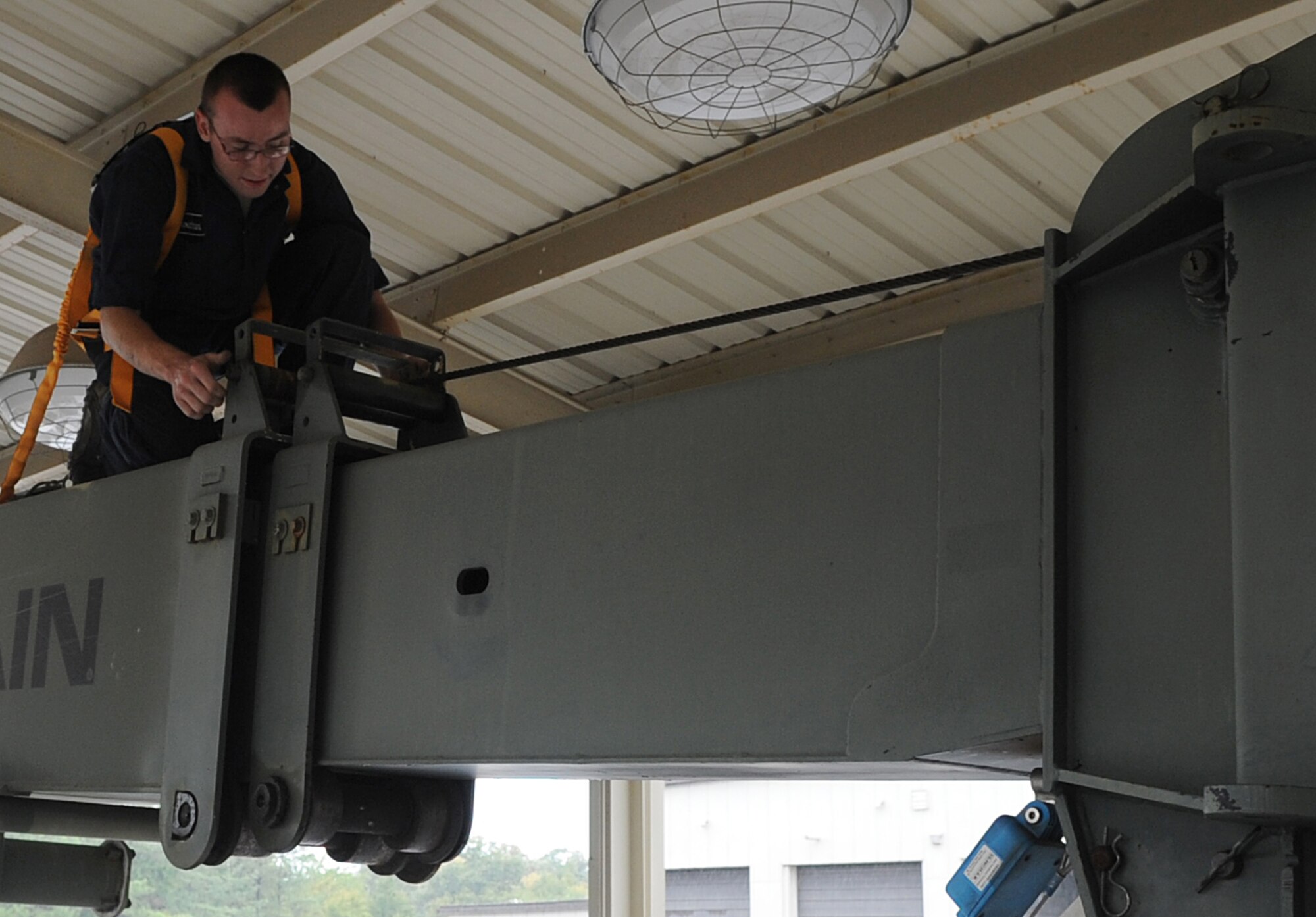 Airman 1st Class Ethan Troutman, a 19th Logistics Readiness Squadron vehicle maintenance apprentice, inspects cables on a boom crane Sept. 11, 2013, at Little Rock Air Force Base, Ark.  Vehicle management personnel are responsible for managing and maintaining the base fleet of vehicles ranging from general purpose to combat support. (U.S. Air Force photo by Staff Sgt. Caleb Pierce)