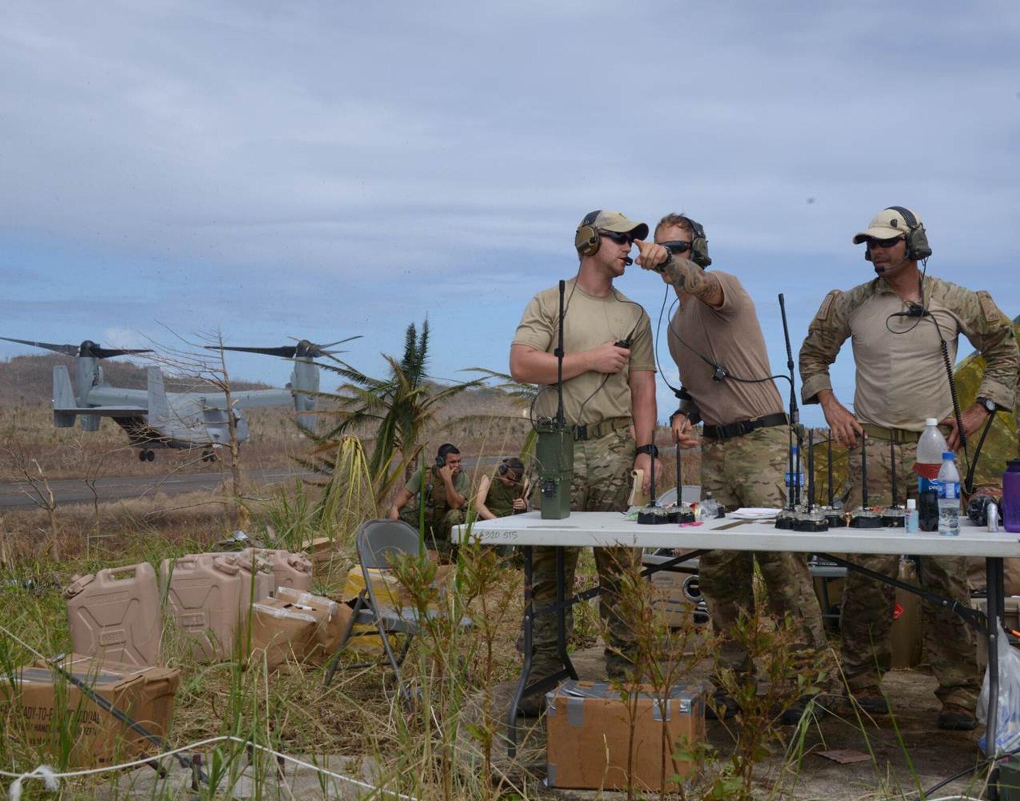 Members from the 353rd Special Operations Group, deployed from Kadena Air Base, Japan in support of Operation Damayan, direct air traffic at Guiuan Airport, Republic of the Philippines Nov. 17.  The special tactics Airmen are directing more than 100 sorties a day to ensure airlift of more than 1,000 Philippine citizens daily in the aftermath of Typhoon Haiyan. (U.S. Air Force photo by Tech. Sgt. Kristine Dreyer)  