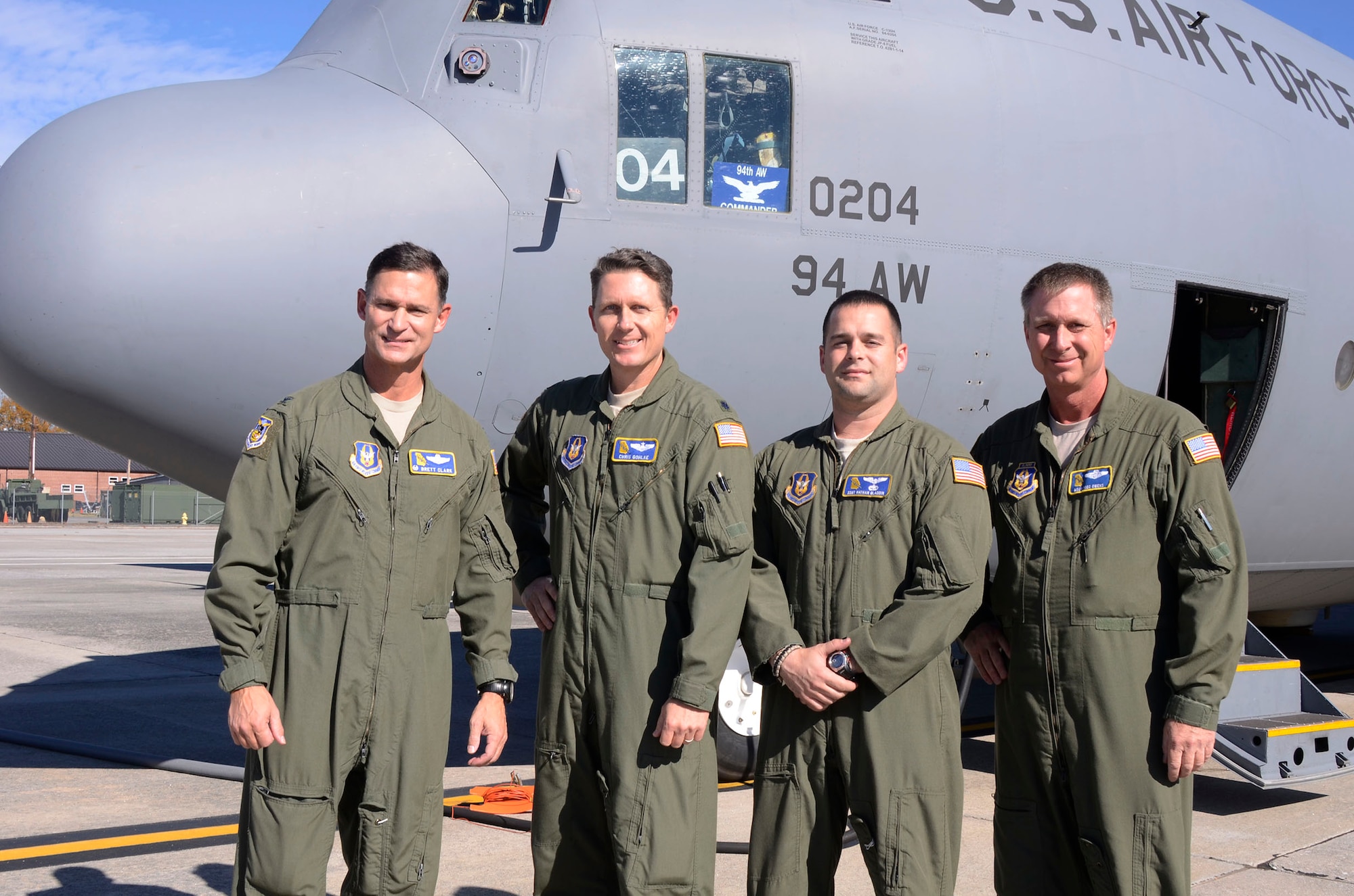Col. Brett J. Clark, newly assigned 94th Airlift Wing commander stands with his crew after completing his first flight at Dobbins Air Reserve Base, Ga., Nov. 19. Clark is responsible for over 2,500 wing personnel, and the entire installation comprised of 13 tenant units, including 22nd Air Force, Air Force Plant 6 and Lockheed-Martin, Georgia Army and Air National Guard and the Army, Navy and Marine Corps Reserves. (U.S. Air Force photo/Don Peek)