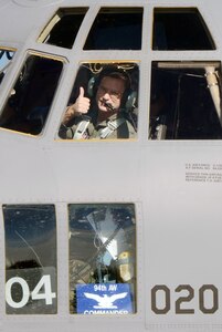 Col. Brett J. Clark, newly assigned 94th Airlift Wing commander gives the thumbs-up after completing his first flight at Dobbins Air Reserve Base, Ga., Nov. 19. Clark is responsible for over 2,500 wing personnel, and the entire installation comprised of 13 tenant units, including 22nd Air Force, Air Force Plant 6 and Lockheed-Martin, Georgia Army and Air National Guard and the Army, Navy and Marine Corps Reserves. (U.S. Air Force photo/Don Peek)