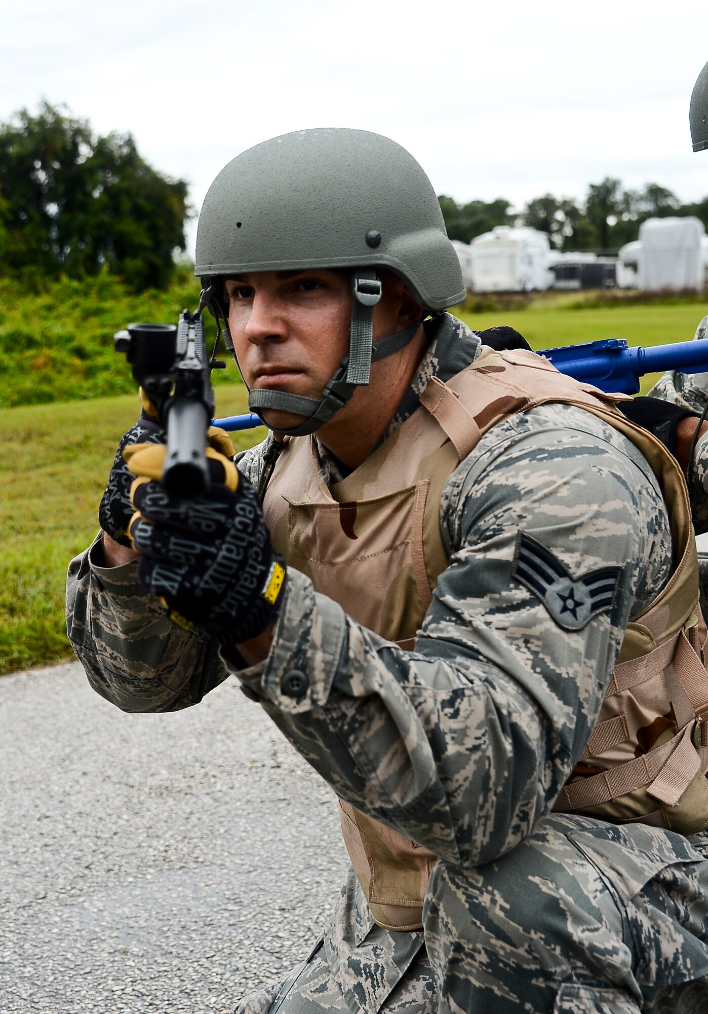 Senior Airman Cody Zaleski, 6th Logistics Readiness Squadron vehicle operator, secures the area during combat convoy training, Nov. 2, 2013 at MacDill Air Force Base, Fla. The training is designed to familiarize vehicle operator Airmen with basic combat skills required to integrate with joint forces in hostile convoy operations. (U.S. Air Force photo by Senior Airman Melanie Bulow-Gonterman/Released)   