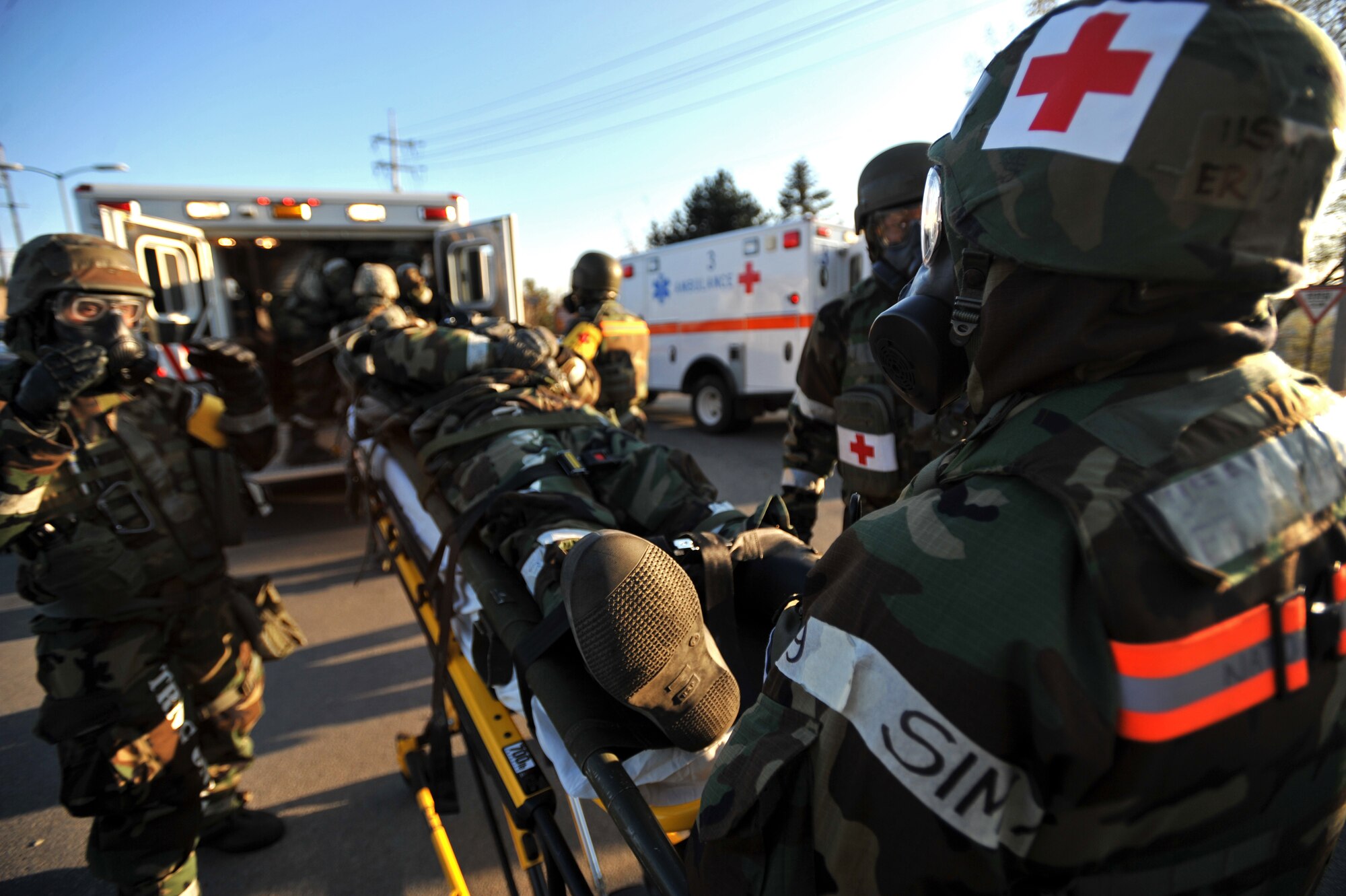 First responders from the 51st Medical Group prepare to transport a simulated victim after the last ground attack of Operational Readiness Exercise Beverly Bulldog 14-01 at Osan Air Base, Republic of Korea, Nov. 21, 2013. Throughout the week-long exercise, Airmen worked together through several different scenarios that tested their ability to defend the base and conduct daily operations during a heightened state of readiness. (U.S. Air Force photo/Senior Airman Siuta B. Ika)