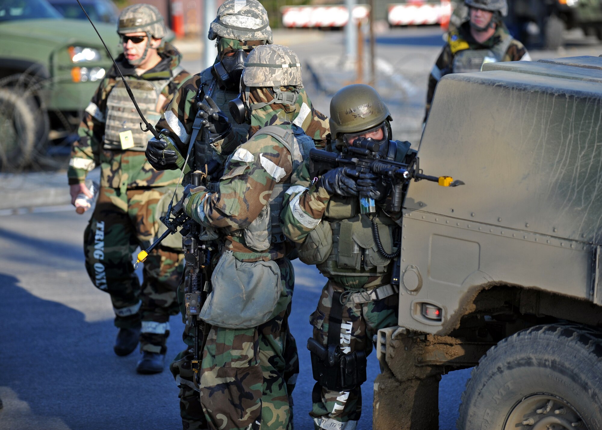 Members of the 51st Security Forces Squadron take on opposition forces during the last ground attack of Operational Readiness Exercise Beverly Bulldog 14-01 at Osan Air Base, Republic of Korea, Nov. 21, 2013. Scenarios like this give Airmen a chance to hone wartime skills in a safe and structured environment in preparation for real-world contingencies. (U.S. Air Force photo/Senior Airman Siuta B. Ika)