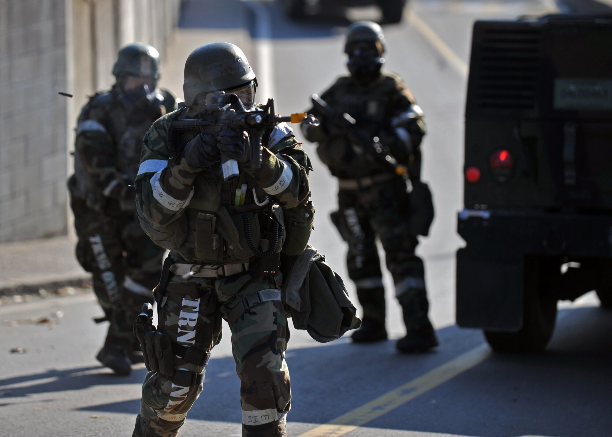 A member of the 51st Security Forces Squadron fires at an opposition forces member during the last ground attack of Operational Readiness Exercise Beverly Bulldog 14-01 at Osan Air Base, Republic of Korea, Nov. 21, 2013. Throughout the week-long exercise, Airmen were tested on procedures to take during ground, mortar and missile attacks on the base. (U.S. Air Force photo/Senior Airman Siuta B. Ika)