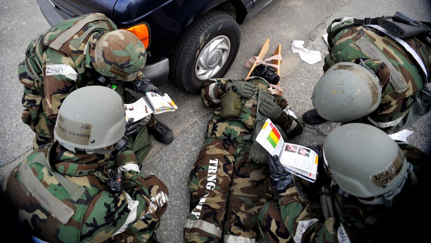 First responders analyze an injury on a simulated victim during Operational Readiness Exercise Beverly Bulldog 14-01 at Osan Air Base, Republic of Korea, Nov. 21,2013. The exercise highlights Osan Airmen’s ability to position, employ and sustain forces, and showcase operational readiness. (U.S. Air Force photo/Staff Sgt. Emerson Nuñez)