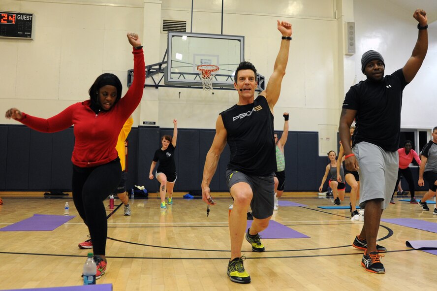 Tony Horton, creator of the home fitness system “P90X,” leads Sailors and Airmen during a workout at the fitness center at Misawa Air Base, Japan, Nov. 20, 2013. Horton is nicknamed the “Master of Motivation,” and spent time taking photos and signing autographs with Misawa members before and after an hour-long workout. (U.S. Air Force photo by Senior Airman Derek VanHorn)