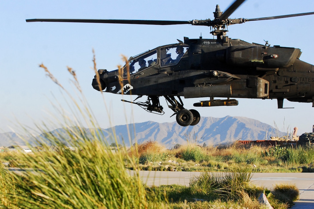 A U.S. Army AH-64 Apache helicopter lifts off from Forward Operating Base Fenty, Afghanistan, Nov. 12, 2013, to conduct a security and reconnaissance mission over eastern Afghanistan.