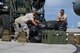Airmen from the 36th Contingency Response Group rearrange equipment on a forklift Nov. 15, 2013, on the Andersen Air Force Base, Guam, flightline before departing to support Operation Damayan in Tacloban City, Philippines. Operation Damayan is a U.S. humanitarian aid and disaster relief effort to support the Philippines in the wake of the devastating effects of Typhoon Haiyan. 