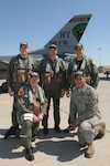 Aircrew members from the 174th Fighter Wing of Syracuse N.Y., pose for a photo after performing the fly-by for the opening day ceremony for the new Yankee Stadium on April 16, 2009. The F-16 Fighting Falcon crew members include bottom row from left to right, Capt. Scott Bissonnette and Staff Sgt. Preston Cox and top row, Maj. Kurt Tongren, Maj. John Knutsen and Lt. Col. Sean McQuaid.