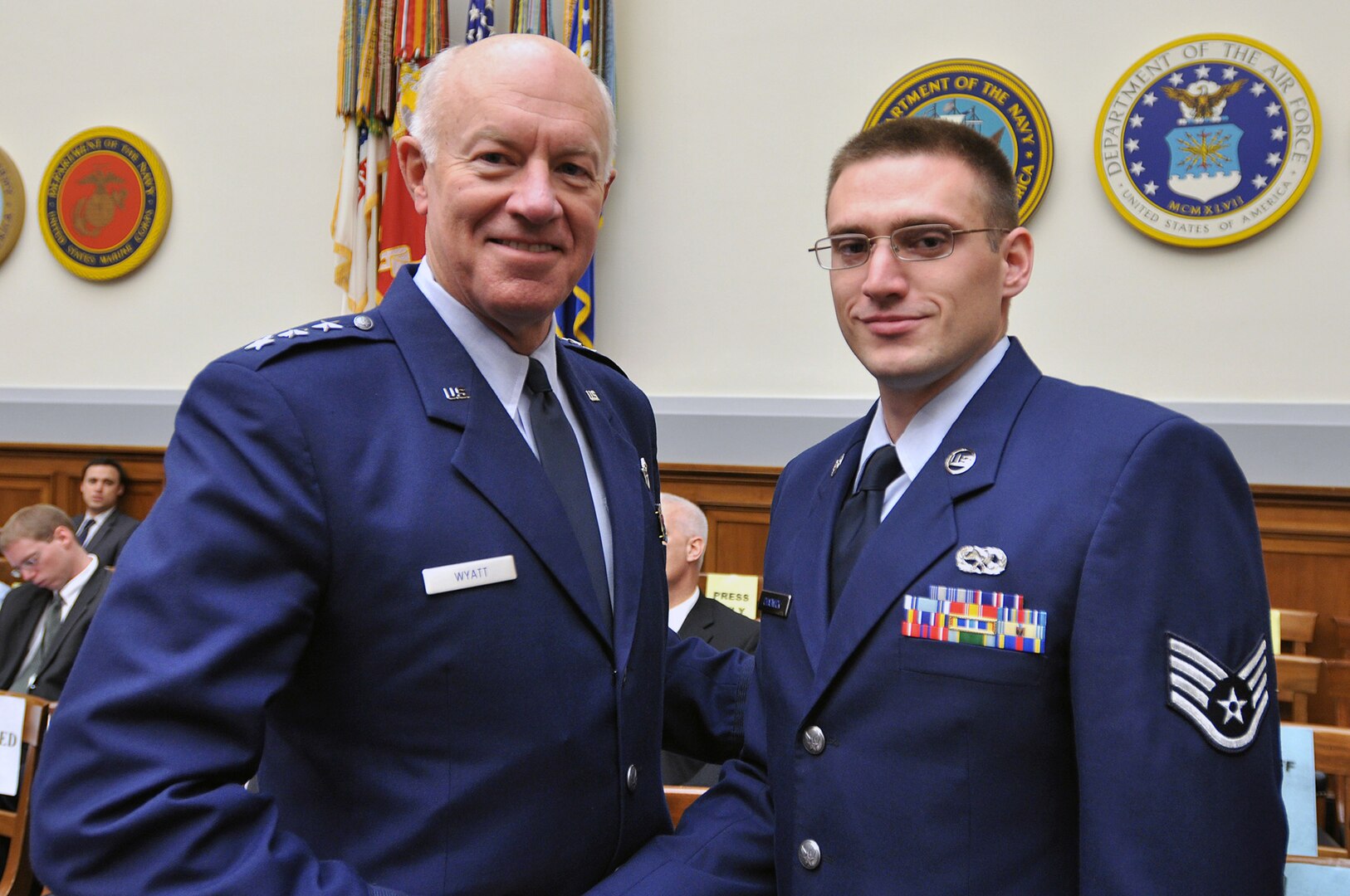 Air Force Lt. Gen. Harry M. Wyatt, director of the Air National Guard, and Air Force Staff Sgt. Wes Chadwick, an avionics technician with the 115th Fighter Wing, Wis., at the Rayburn House Office Building in Washington April 22 in a congressional hearing on the state of the nation's Air Sovereignty Alert (ASA) operations. The Air Guard operates 16 of the 18 ASA sites located across the United States to protect the nation's airspace.
