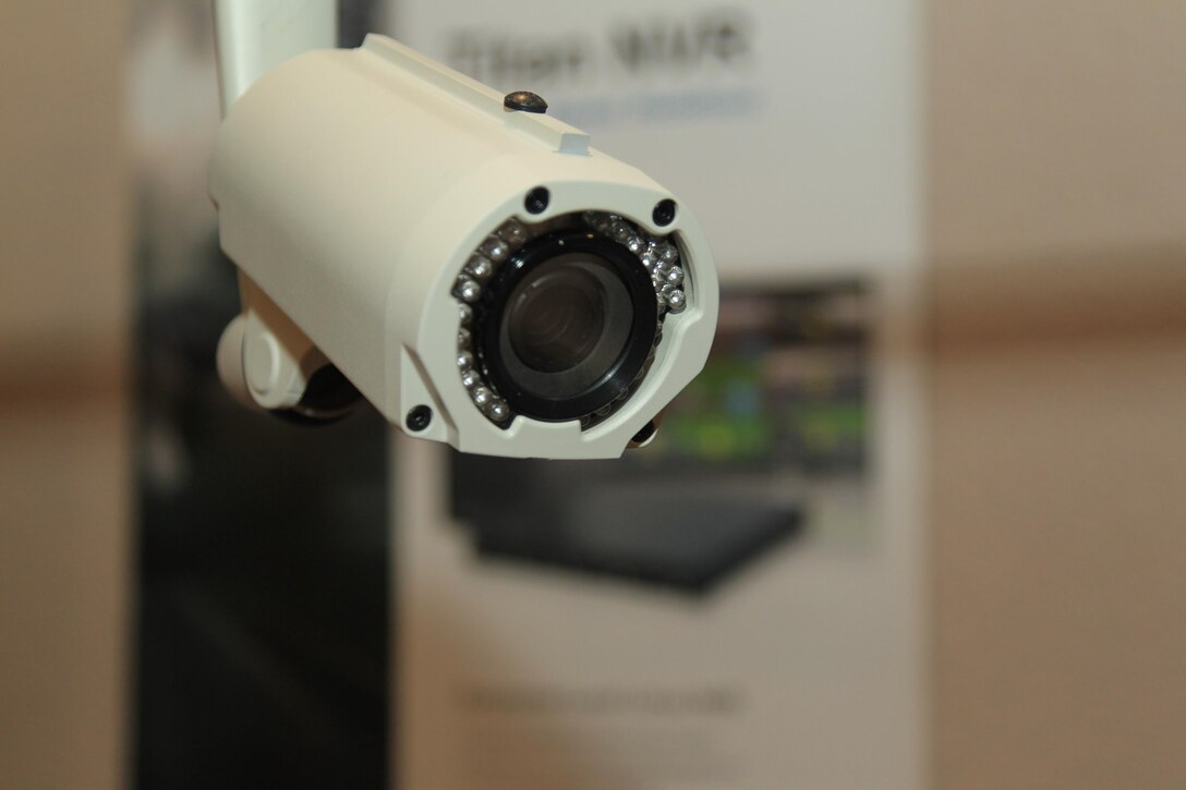 An IP Bullet Camera, manufactured by Advanced Technology Video, is showcased during a technology exposition at the Officers' Club Nov. 19, 2013.