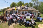 National Guard Soldiers, Airmen and civilians from the National Capital Region repair a home in Nanjemoy, Md., April 25 during a Christmas in April volunteer project that assisted an elderly couple on National Rebuilding Day. It was the 15th year that Guardmembers volunteered in the event, which takes place annually on the last Saturday in April.