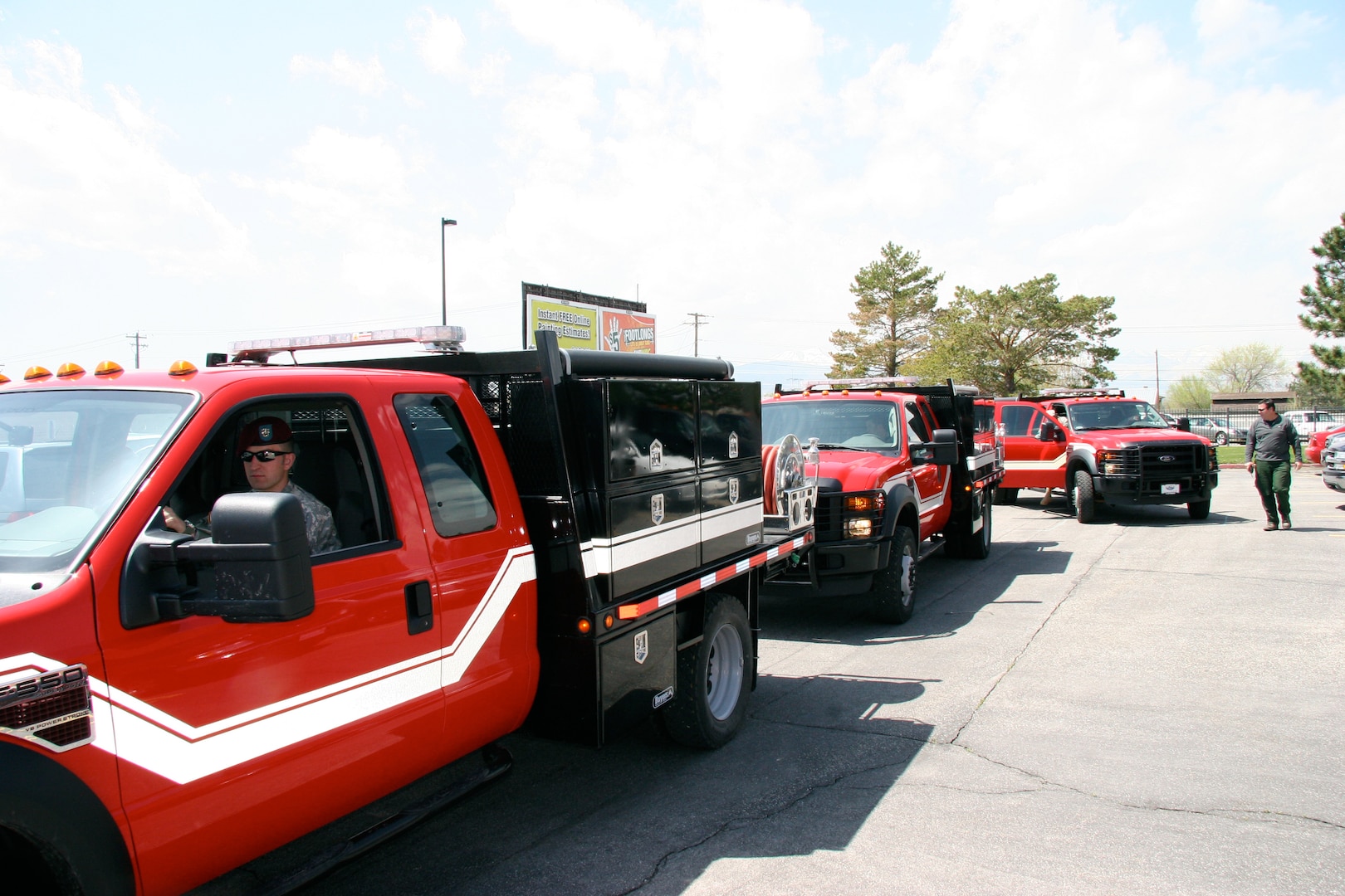 The Utah National Guard accepted delivery of four new fire trucks for Camp Williams on April 29, 2009 at the Draper, Utah headquarters. Each truck will be staffed with two firefighters and an engine boss, trained and selected from among the 60 Utah National Guard Soldiers, who are currently red-card certified to fight wildland fires.