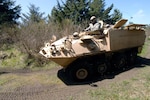 Members of the Oregon National Guard's Counterdrug Support Program put their light armored vehicle through its paces at the Rilea Training Site, in Warrenton, Ore., May 5. Soldiers and airmen trained on the LAV with members of the Salem Police during an inter-agency event.