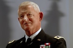 Lt. Gen. Clyde A. Vaughn, director of the Army National Guard, listens as Gen. Craig McKinley, chief of the National Guard Bureau, makes his remarks during Vaughn's retirement ceremony May 6, 2009 at the Army National Guard Readiness Center in Arlington, Va.