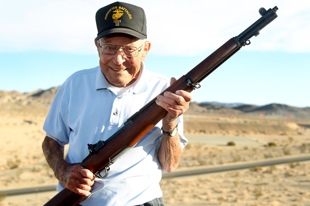 Retired Sgt. Maj. Ray V. Wilburn fired the first shot of the High Desert Shooting Club National Rifle Association High-Power and Long-Range Regional Match at the Combat Center rifle range Nov. 15. Wilburn fired the M1 Garand, the same type of rifle he used during WWII, from the 1000-yard line, but not before giving the competitors of the competition some words of wisdom. “The Marine Corps is known for having the finest shooters,” Wilburn said, before firing. “Have any of you heard of a Warrant Officer Peter Ford? By my knowledge, he was the first Marine to fire a ‘Possible.’ Well, I’m about to shoot the ‘Impossible.’"


