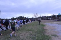 Marines with Transportation and Support Company, Combat Logistics Battalion 2, 2nd Marine Logistics Group run a 5k to commemorate Cpl. Christopher M. Monahan Jr. and Lance Cpl. Dale W. Means aboard Camp Lejeune, N.C., Nov. 22, 2013. Monahan and Means were both killed in action while conducting combat operations in Helmand province, Afghanistan, in support of Operation Enduring Freedom.