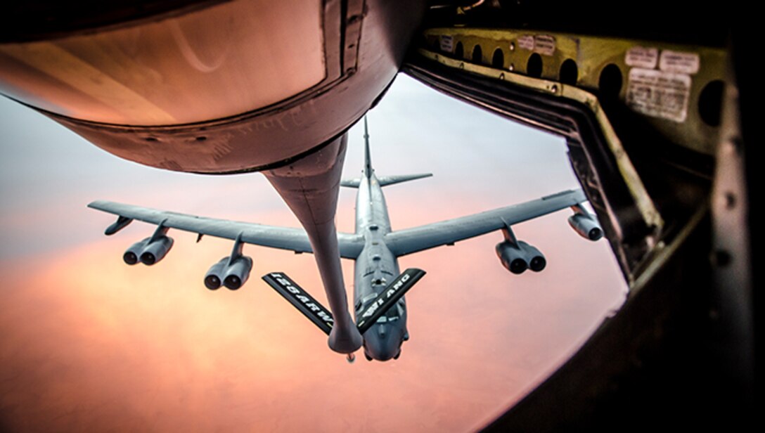 Members of a KC-135 Stratotanker crew refuel a B-52 Stratofortress during a training exercise Nov. 3, 2013. The crew is assigned to the 128th Air Refueling Wing, Milwaukee, Wisc. The mission of the 128th ARW is to transfer fuel to U.S. military and allied aircraft, provide aeromedical evacuation, and airlift personnel and equipment to strategic locations in a cost effective manner. 