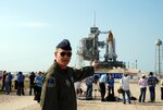 Col. Michael Canders, commander of the New York Air National Guard's 106th Rescue Wing, based at Westhampton Beach, explains how NASA astronauts would bail out of the Atlantis Space Shuttle (background) if a parachute descent to safety was required, known as a Mode 8 Emergency Egress. On May 11, 2009, the 106th Rescue Wing participated in its 100th mission in support of NASA's Space Shuttle launch program at Kennedy Space Center, Cape Canaveral, Fla.