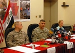 Col. Marc Ferraro (center), commander of the 56th Stryker Brigade Combat Team, Linda Specht (right) leader of the embedded Provincial Reconstruction Team working with the 56th SBCT, and Capt. Cory Angell (left), 56th SBCT public affairs officer, listen to a question from an Iraqi journalist during a press conference May 12 in the International Zone, Baghdad.