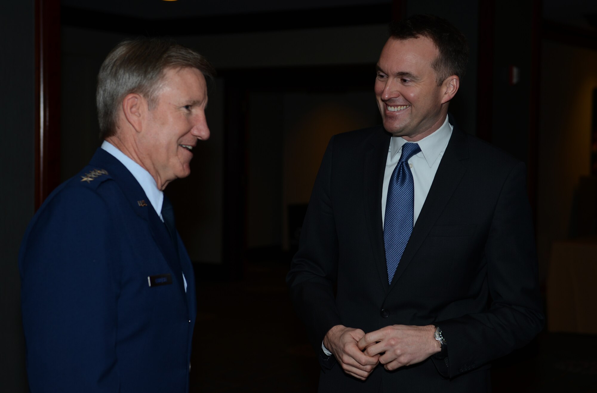 Acting Secretary of the Air Force Eric Fanning (right) speaks with Gen. Hawk Carlisle, Pacific Air Forces commander(left) before the beginning of events Nov 22, 2013, at at the Air Force Association Pacific Air & Space Symposium, Los Angeles, Calif. Fanning spoke on the state of the force and the Air Force’s position in space and cyberspace. Carlisle is the commander of the Pacific Air Forces.