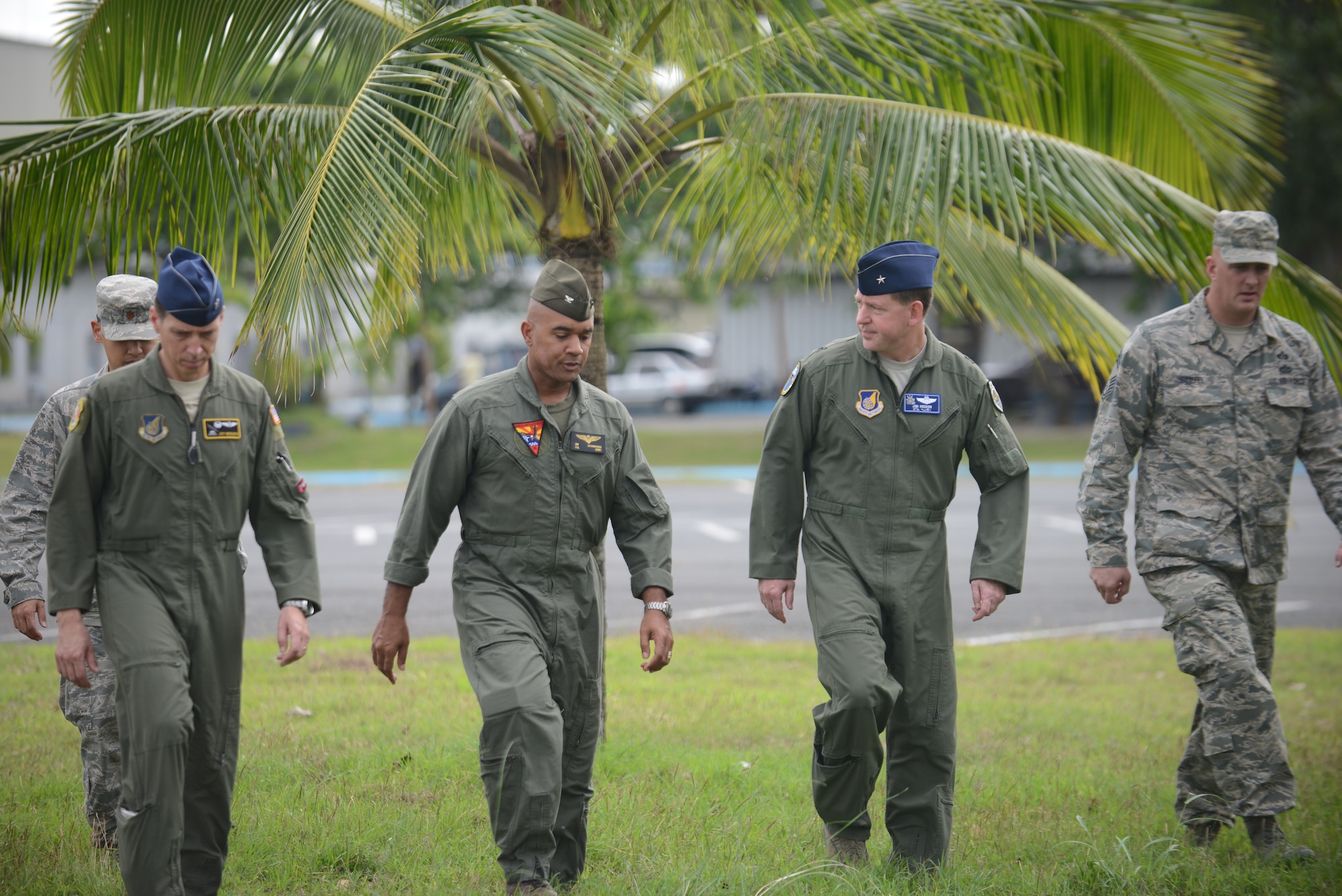 Brig. Gen. James Hecker (second from right), commander of Air Coordination Component Element, Joint Task Force 505, visits Clark Air Base, Republic of the Philippines, to meet with and thank Airmen and Marines for their support to Operation Damayan Nov. 21, 2013. (U.S. Air Force photo by 2nd Lt. Jake Bailey/Released)
