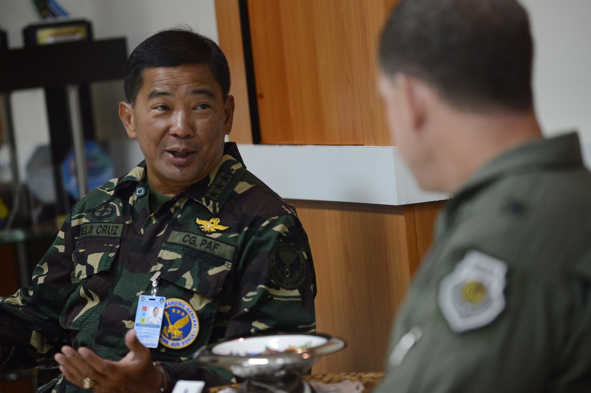 Brig. Gen. James Hecker, commander of Air Coordination Component Element, Joint Task Force 505, meets with Lt. Gen. Lauro Dela Cruz, the commanding general of the Philippine Air Force, at Villamor Air Base, Manila, Nov. 21, 2013. (U.S. Air Force photo by 2nd Lt. Jake Bailey/Released)