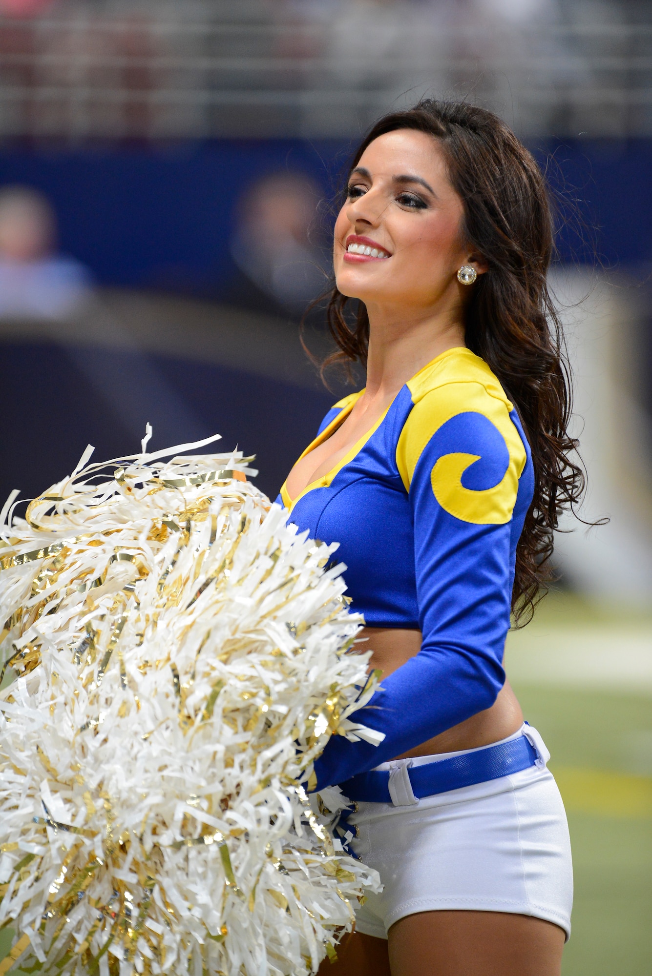 Capt. Michelle Kolcun, 375th Medical Group healthcare  manager, was selected to be a cheerleader for the St. Louis Rams and has been supporting the team during games played at home since June. She began cheerleading while attending school at the Air Force Academy and has since been on three pro and semi-pro cheer squads. (Courtesy photo).