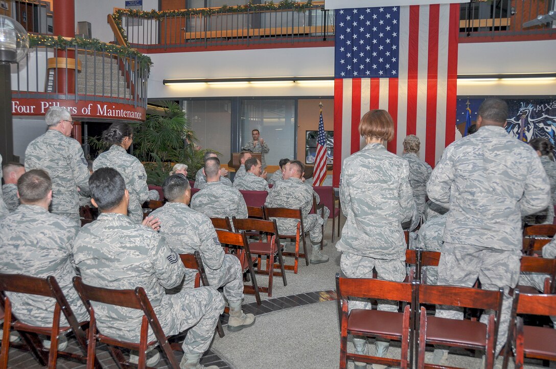 TRAVIS AIR FORCE BASE, Calif. -- Col. Jeff Pickard, 349th Maintenance Group commander, and Maj. Carlton Thompson Jr., 349th Maintenance Operations Flight commander, during an inactivation ceremony Nov. 17, 2013, at Travis Air Force Base, Calif. (U.S. Air Force photo/Tech. Sgt. Rachel Martinez)