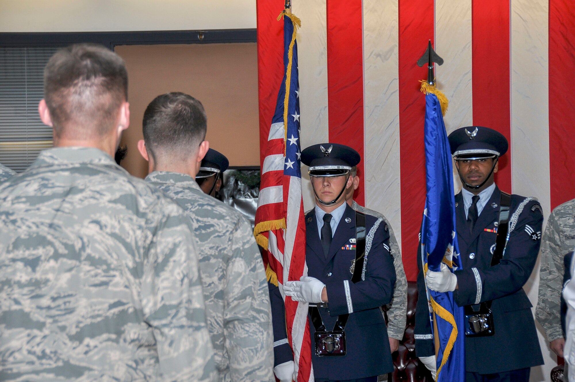TRAVIS AIR FORCE BASE, Calif. -- Col. Jeff Pickard, 349th Maintenance Group commander, and Maj. Carlton Thompson Jr., 349th Maintenance Operations Flight commander, during an inactivation ceremony Nov. 17, 2013, at Travis Air Force Base, Calif. (U.S. Air Force photo/Tech. Sgt. Rachel Martinez)