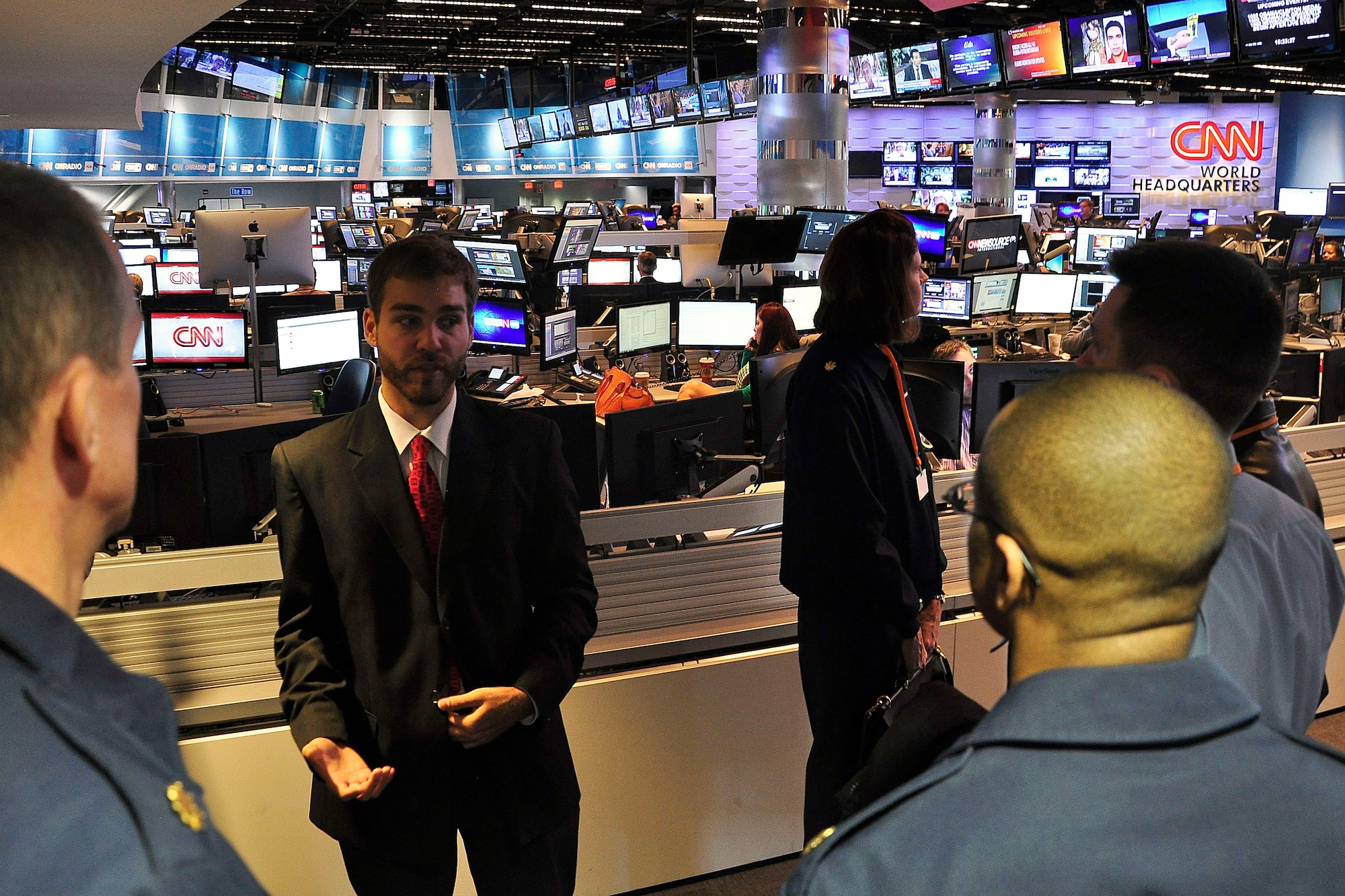 Ryan Burle, from “Inside CNN,” guides students from the Air Command and Staff College through the news network’s headquarters facilities Nov. 20. The visit included discussion of military-media relations with Jim LeMay, consultant for CNN, and a subsequent trip to the Defense Video and Imagery Distribution System facility, also located in Atlanta. The students’ trip was part of the elective course “The War for Public Opinion,” produced by the U.S. Air Force Public Affairs Center of Excellence.  The course provides future leaders with an understanding of the impact of modern global information environment and the need for members of the armed forces at every level to be prepared to communicate effectively with the public they serve. (U.S. Air Force photo by Lt. Col. Don Langley)