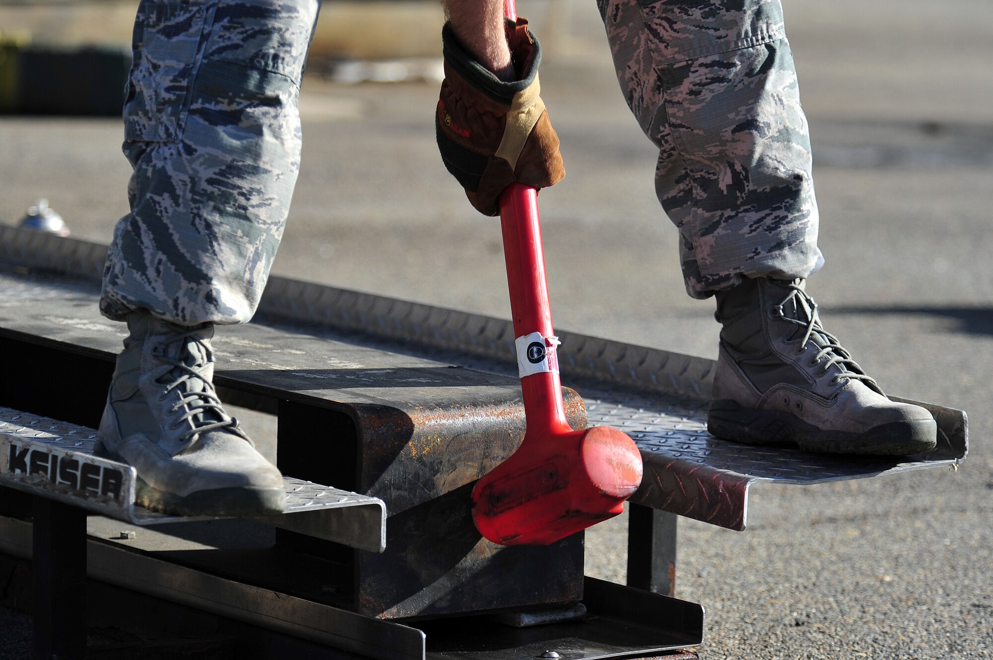 A 4th Fighter Wing member participates in the firefighter challenge at Seymour Johnson Air Force Base, N.C., Nov. 22, 2013.  The challenge promoted unity, morale and emphasized the physical pillar of the Comprehensive Airman Fitness program. (U.S. Air Force photo by Tech. Sgt. Brittany E. Jones)