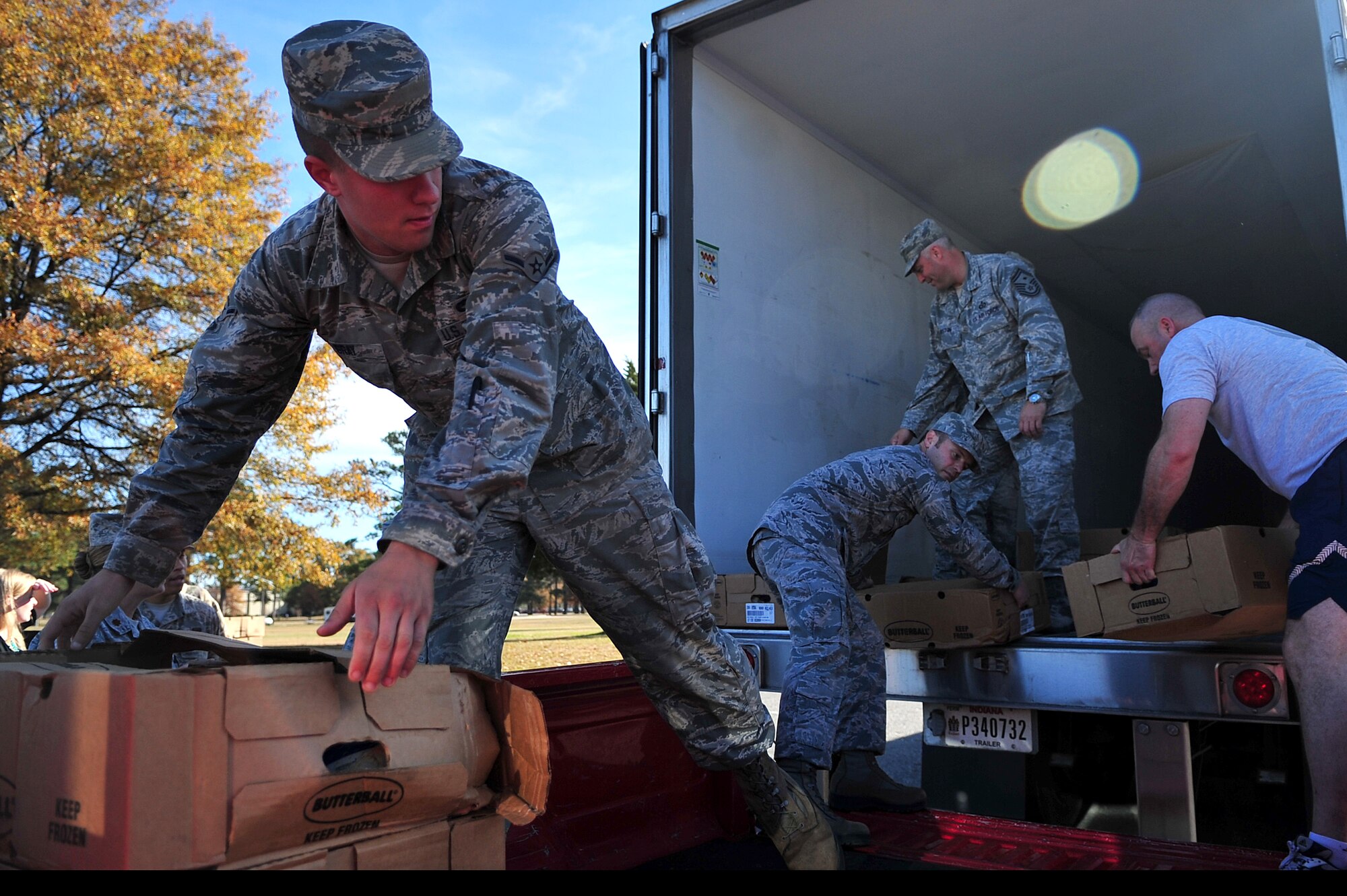 (From left) U.S. Air Force Airman Dustin Gray, 4th Equipment Maintenance Squadron, Master Sgt. Geoffrey Kane, 4th Operations Group,
Senior Master Sgt. Donald Huston, 4th Component Maintenance Squadron and Senior Master Sgt.  Matthew Stathakis, 4th Civil Engineer Squadron, unload nearly 400 frozen turkeys donated by Butterball and the United Services Organization at Seymour Johnson Air Force Base, N.C., Nov. 22, 2013. The turkeys and other Thanksgiving meal items will be given to members of Team Seymour and their families who may need a little extra help during the holiday season.  (U.S. Air Force photo by Tech. Sgt. Brittany E. Jones)

