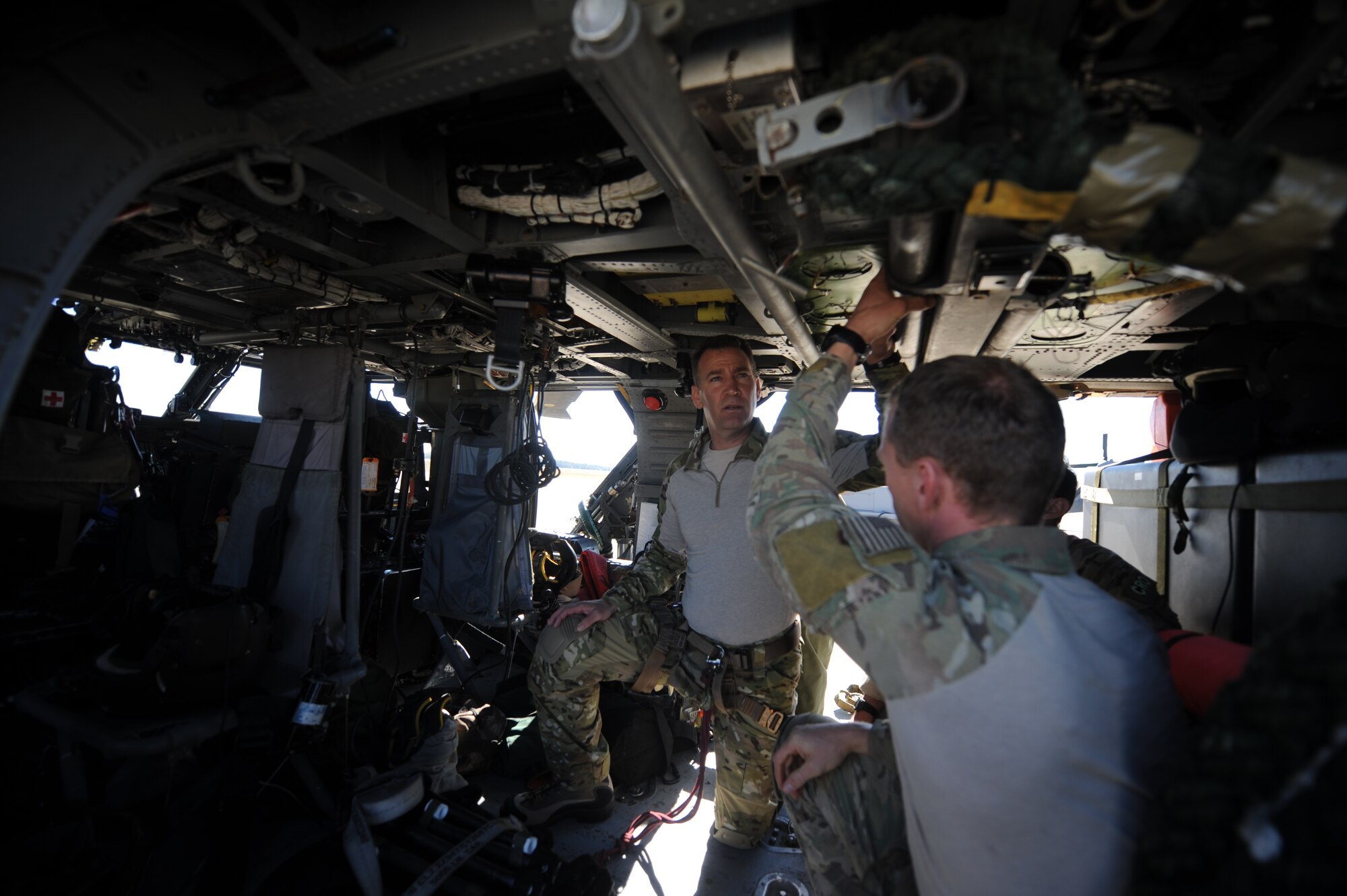 U.S. Air Force Col. Chad Franks, 23d Wing commander, goes through ground training before alternate insertion/extraction training at Moody Air Force Base, Ga., Nov. 19, 2013. . Ground training included classroom instruction and a walkthrough of the HH-60G Pave Hawk. (U.S. Air Force photo by Airman 1st Class Sandra Marrero/Released)

