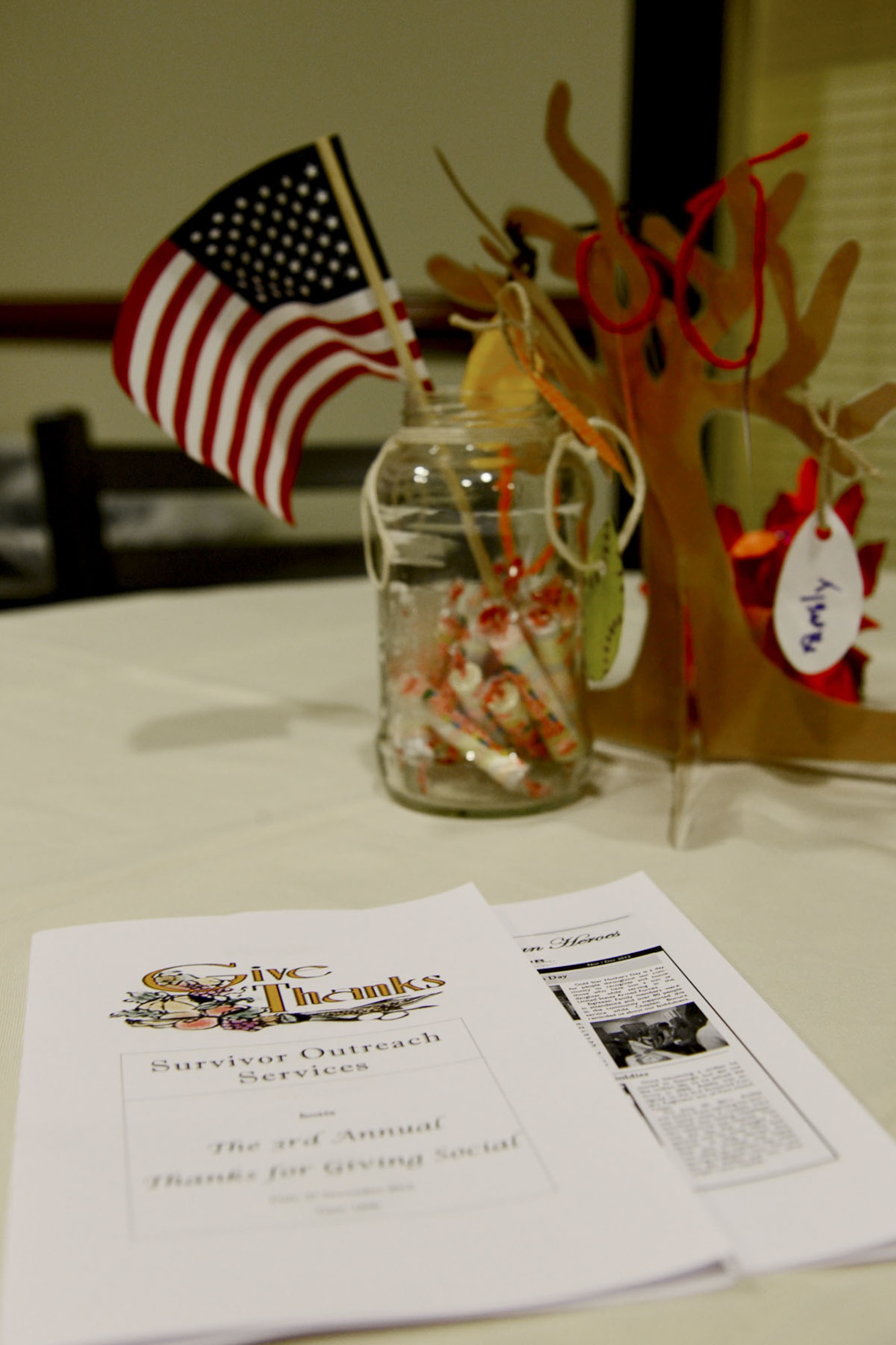 The Fort Eustis Army Support Activity Survivor Outreach Services hosted the third annual “Thanks for Giving” potluck social at the 733rd Mission Support Group headquarters at Fort Eustis, Va., Nov. 21, 2013. Approximately 70 family members of fallen Service members, known as “Gold Star families,” interacted with others as they ate dinner and later observed a talent show. (U.S. Air Force photo by Staff Sgt. Ashley Hawkins/Released)
