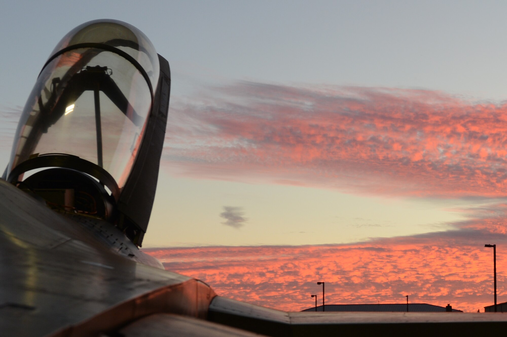An F-16 Fighting Falcon assigned to the 20th Fighter Wing sits parked with the cockpit open at Shaw Air Force Base, S.C., Nov. 19, 2013. Shaw is the home to three F-16 fighter squadrons: the 55th Shooters, 77th Gamblers, and 79th Tigers. (U.S. Air Force photo by Tech. Sgt. Frank Miller/Released)
