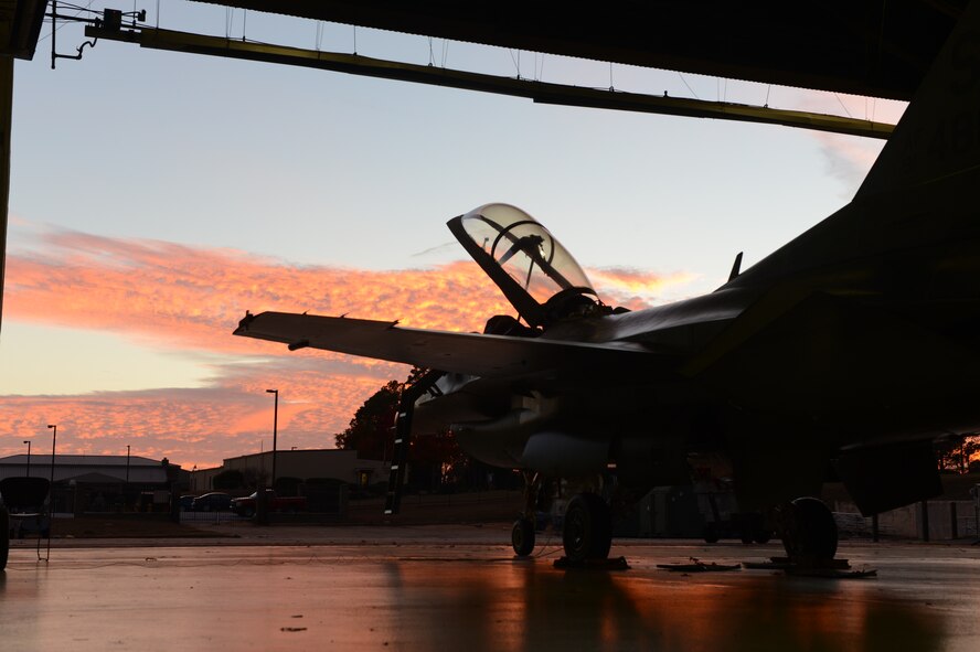 An F-16 Fighting Falcon assigned to the 20th Fighter Wing sits parked under an awning at Shaw Air Force Base, S.C., Nov. 19, 2013. The F-16 was prepared to play an important role, in a recent operational readiness exercise, which demonstrated the ability of the 20th FW to safely and promptly provide air superiority. (U.S. Air Force photo by Tech. Sgt. Frank Miller/Released)