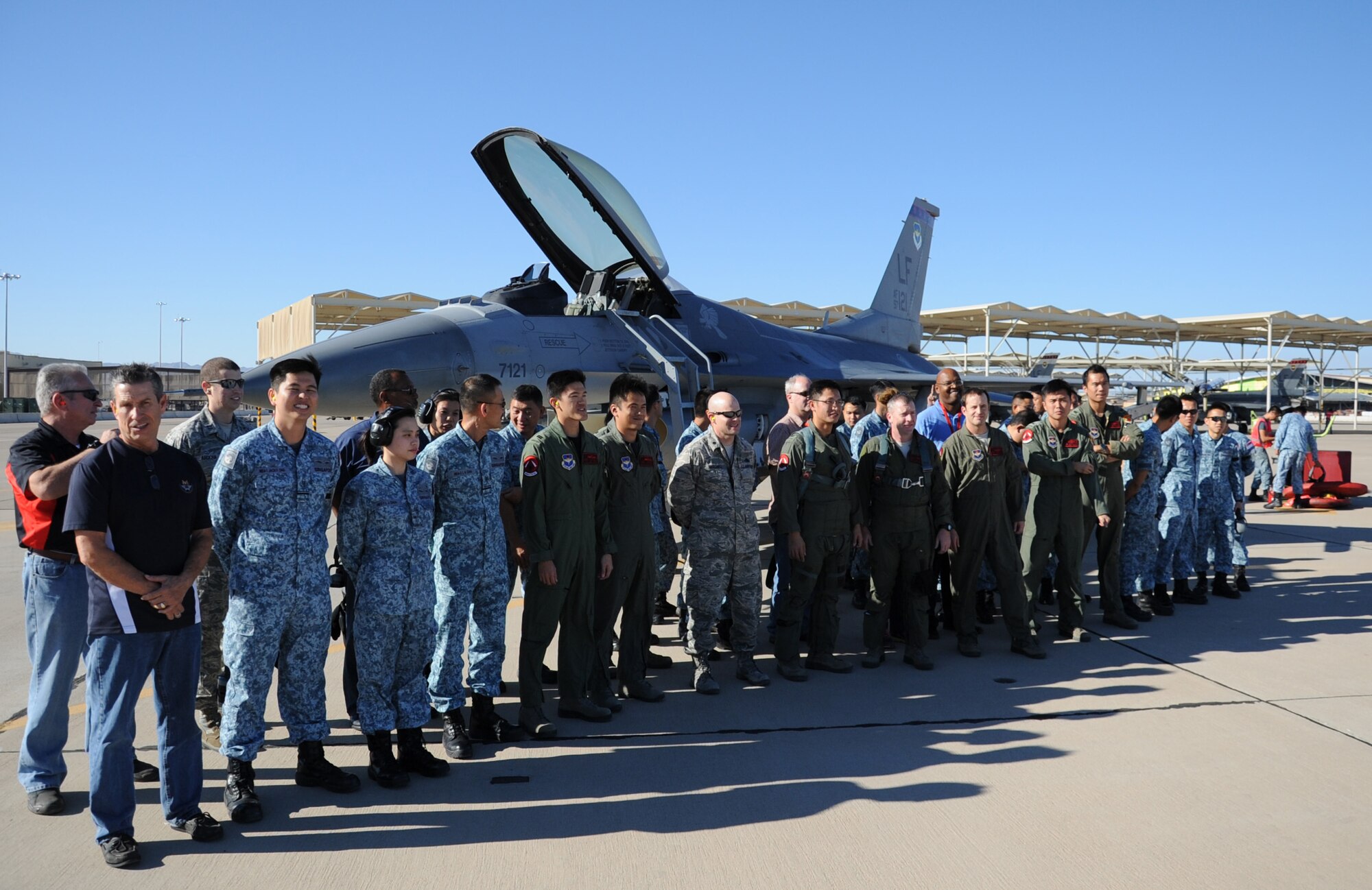 Members of the 425th Fighter Squadron pose for a group photo Nov. 13 on the flightline at Luke Air Force Base. The 425th FS celebrated reaching a milestone of 50,000 flying hours. (U.S. Air Force photo/Staff Sgt. Luther Mitchell Jr.)