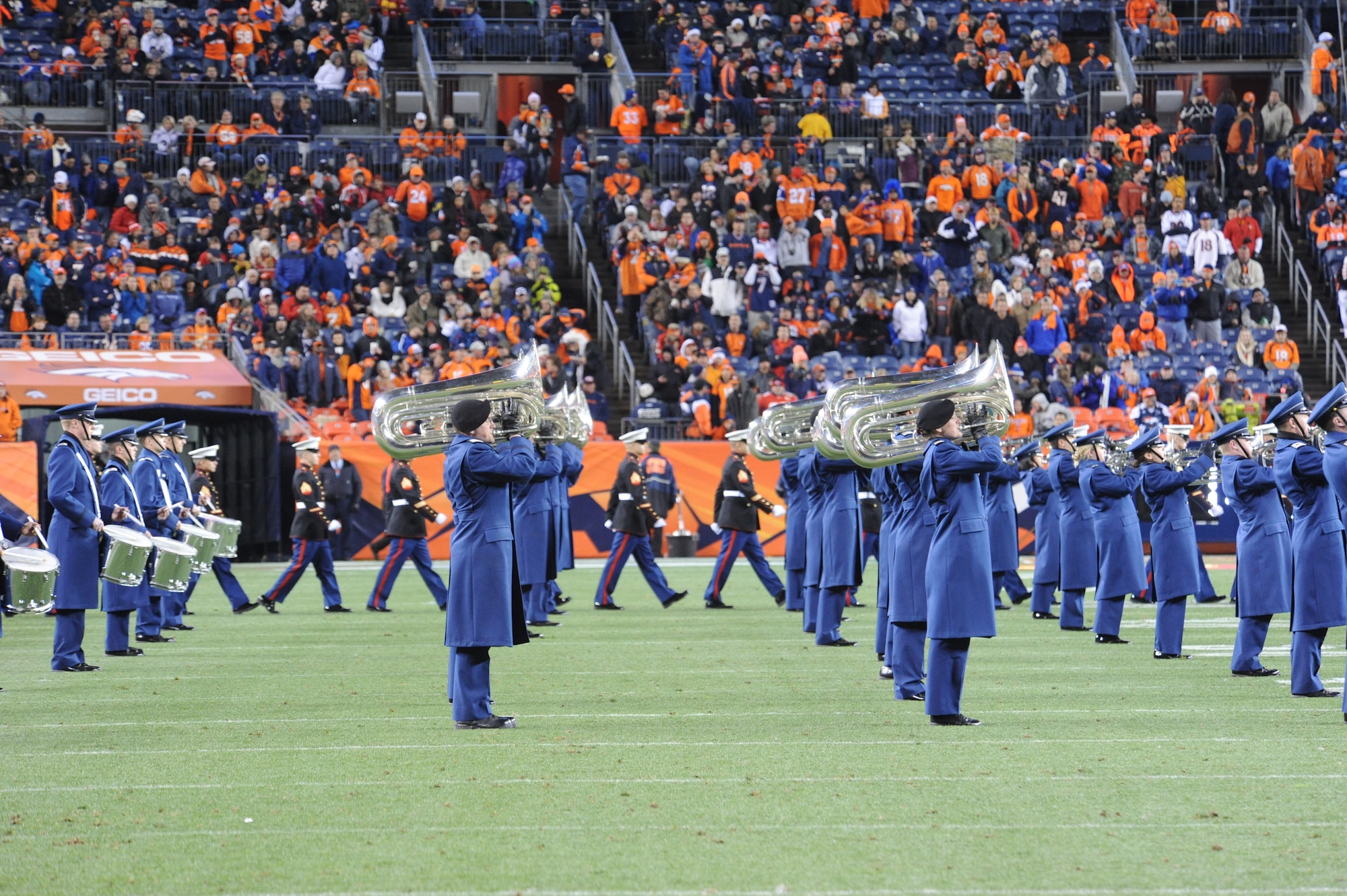 The U.S. Air Force Academy Drum and Bugle Corps performs at halftime during the NFL's Military Appreciation Game at Sports Authority Field in Denver Nov. 17. Known as the "Flight of Sound," the corps' primary mission is to support the Academy's Cadet Wing activities, including military formations and Academy athletic competitions. 