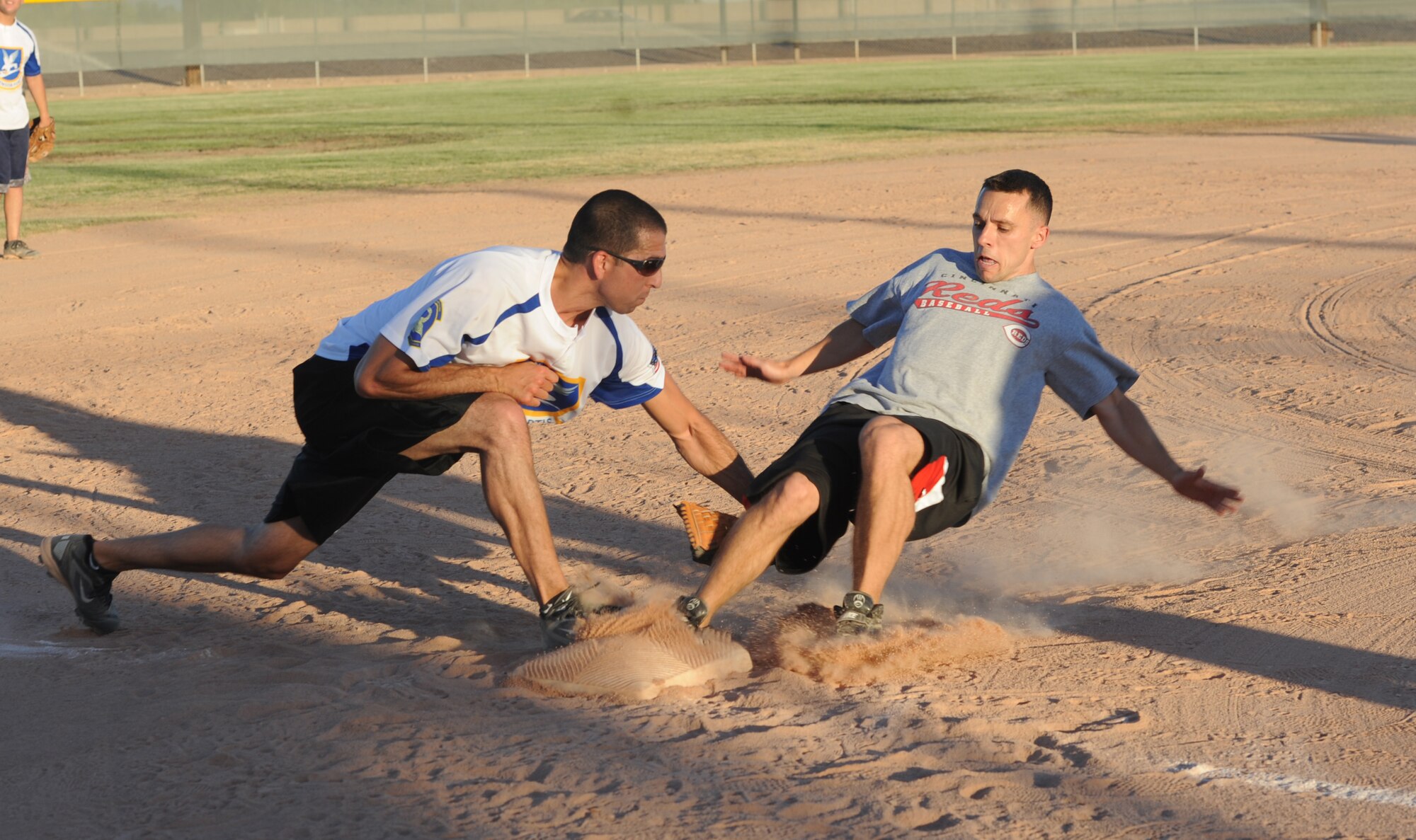 Michael Dicicco, left, 56th Security Forces Squadron, guards the base during an intramural sports game at Luke Air Base. Dicicco is actively involved in four sports and encourages his Airmen to get involved too. (U.S. Air Force photo/Senior Airman David Owsianka)