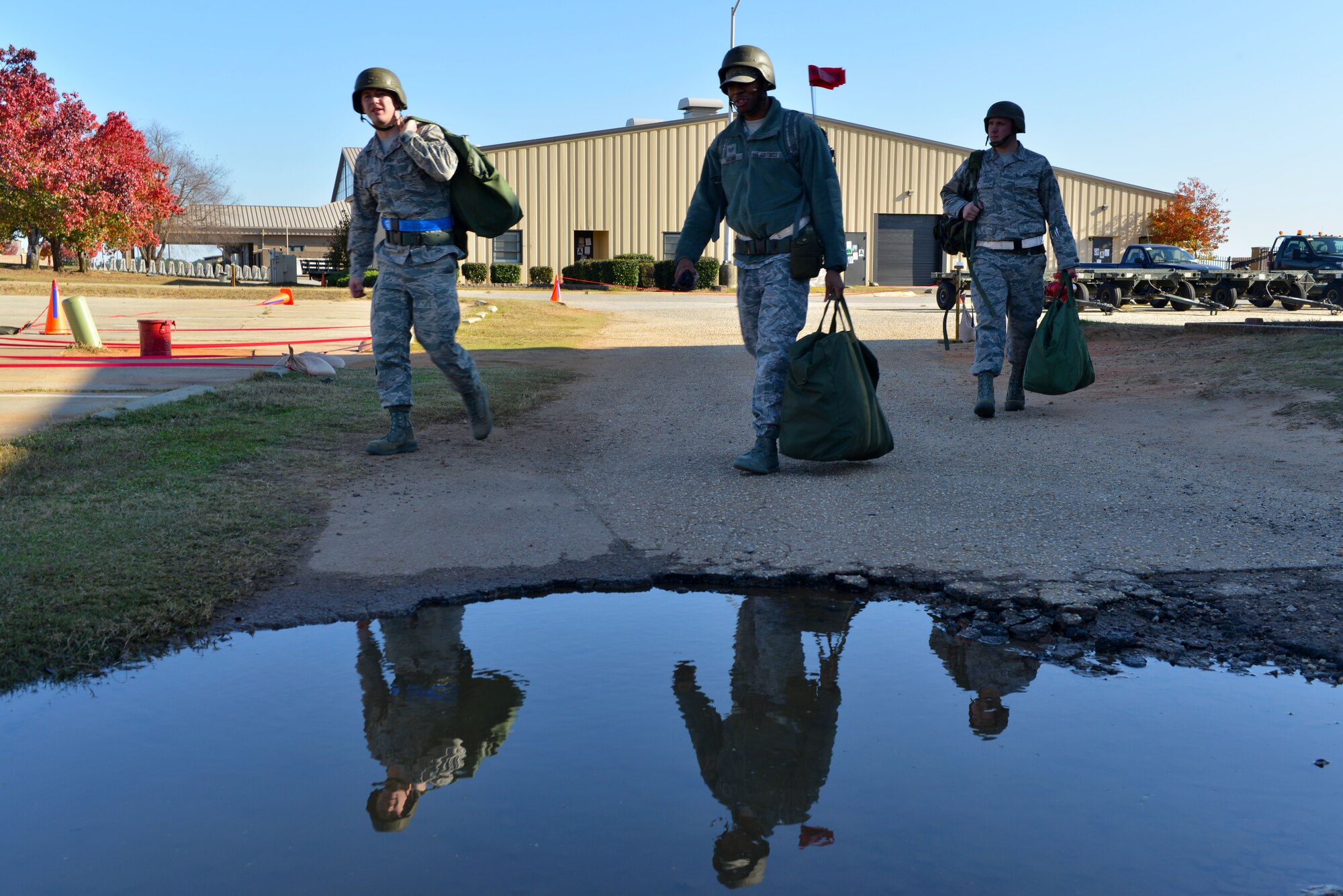Members of a post-attack reconnaissance team comprised of wing staff agency Airmen perform a facility PAR sweep during a recent operational readiness exercise at Shaw Air Force Base, S.C., Nov. 20, 2013. PAR sweeps are performed after the base experiences indirect fire and chemical attacks. Exercises test the 20th Fighter Wing’s ability to defend and execute the mission in a heightened state of readiness. (U.S. Air Force photo by Airman 1st Class Jensen L. Stidham)