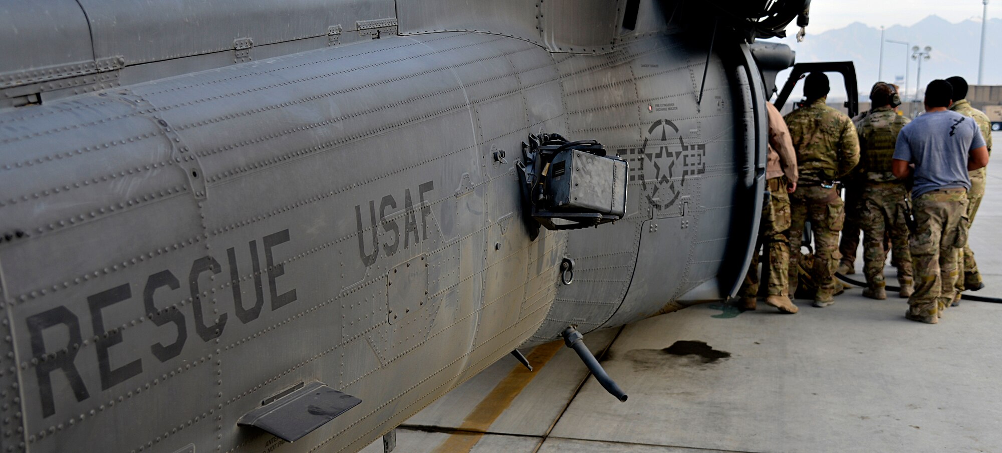 U.S. Air Force Airmen assigned to the 83rd Expeditionary Rescue Squadron prepare for a training mission at Bagram Airfield, Afghanistan Nov. 22, 2013. The 83rd ERQS performs their training missions to ensure they maintain proficiency of their mission capabilities. (U.S. Air Force photo by Senior Airman Kayla Newman/Released)