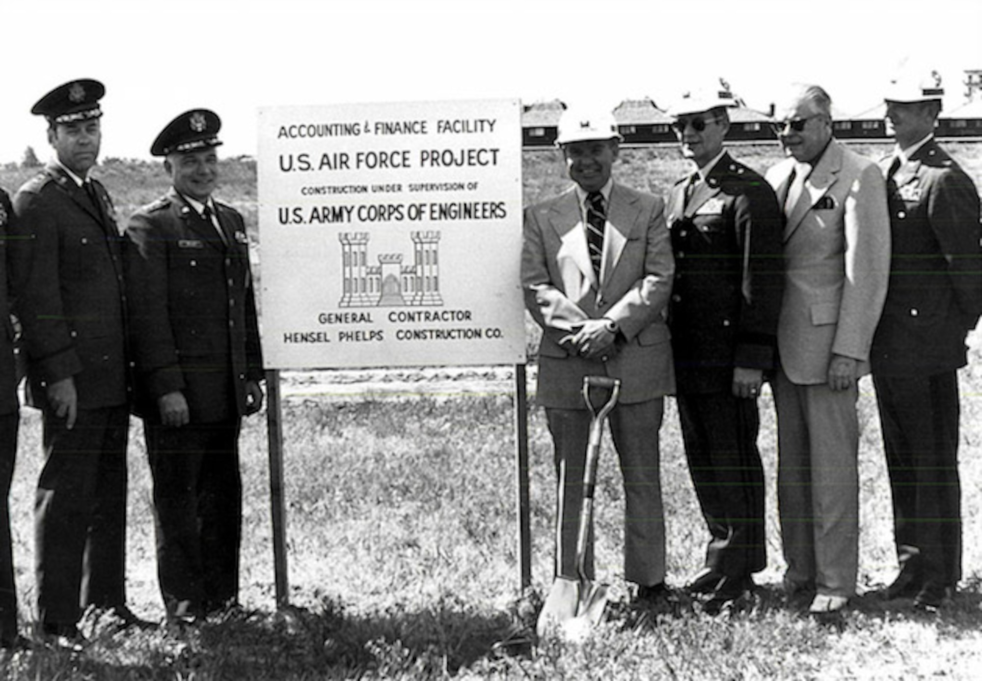 Officials from the Air Reserve Personnel Center, Air Force Accounting and Finance Center, and U.S. Army Corps of Engineers pose for a photo during a groundbreaking ceremony held at the former Lowry Air Force Base, Colo., May 24, 1974. (U.S. Air Force photo)