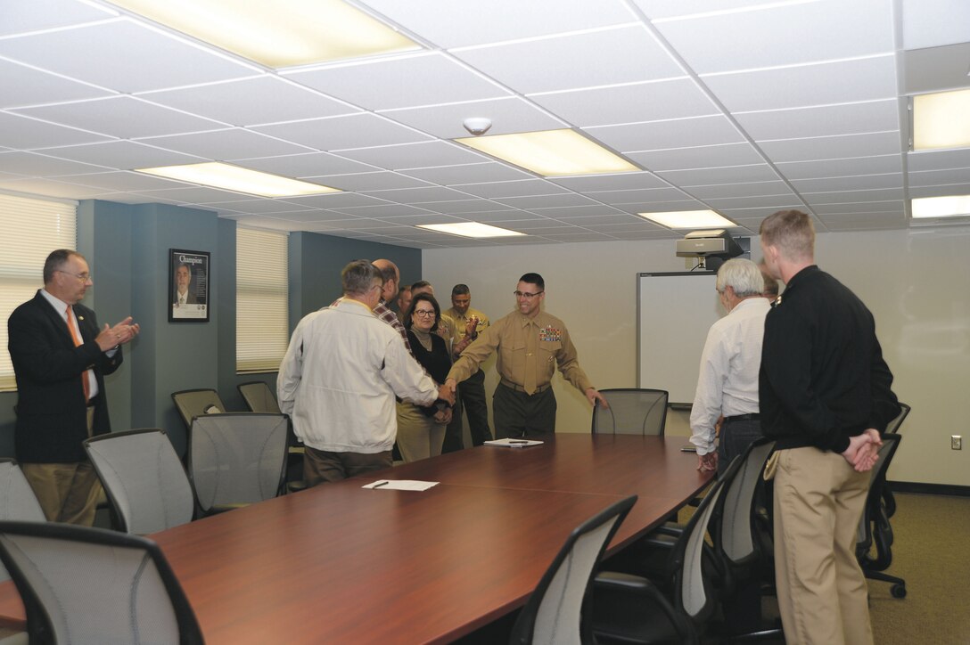 Brig. Gen. Robert F. Castellvi, commanding general, Marine Corps Installations, East/Commander, Marine Corps Base Camp Lejeune, N.C., recognizes base Marines Tuesday for their numerous accomplishments.